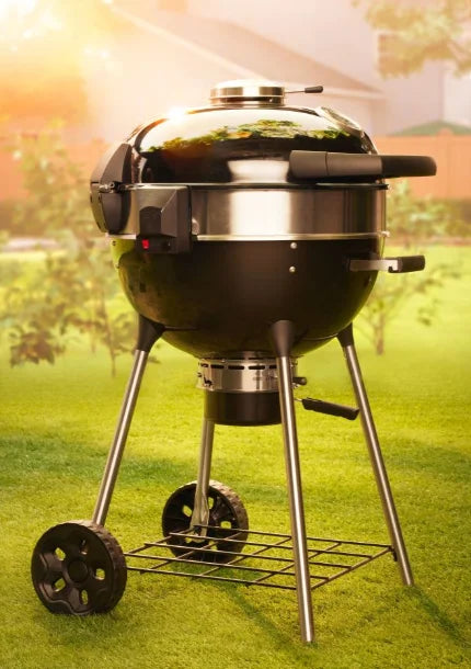 Napoleon Professional 22" Charcoal Kettle features porcelain-coated cast iron WAVE cooking grids, adjustable height settings, and Vortex Heat Management System for even convection and precision heat control.