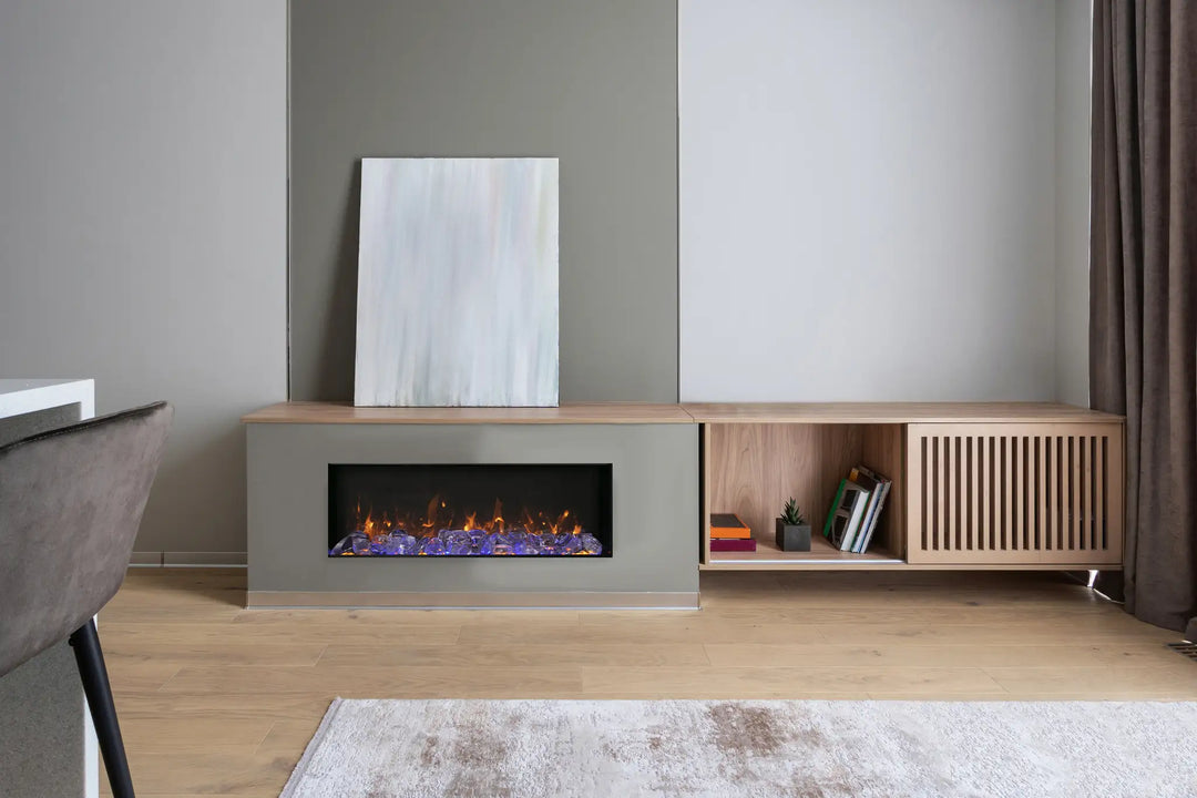 Amantii Panorama BI Slim Smart Electric Fireplace with thin black steel surround, measuring just 4" in depth, featuring vibrant multi-colored flame presentation, 2-stage heater and thermostat hardwire ready for indoor or outdoor installation.