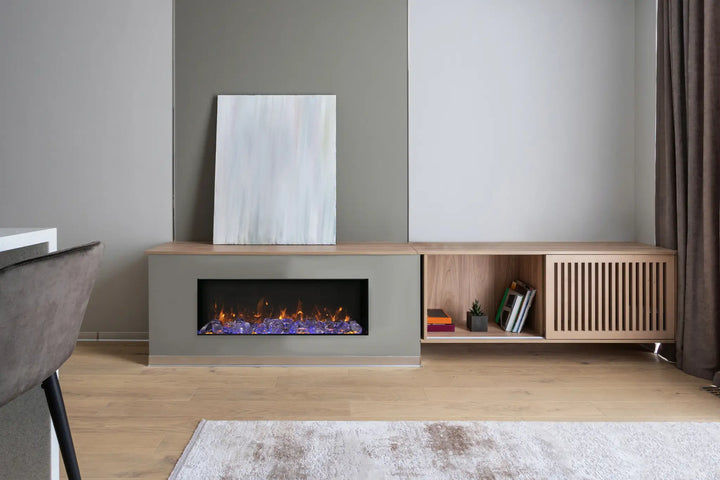 Amantii Panorama BI Slim Smart Electric Fireplace with thin black steel surround, measuring just 4" in depth, featuring vibrant multi-colored flame presentation, 2-stage heater and thermostat hardwire ready for indoor or outdoor installation.