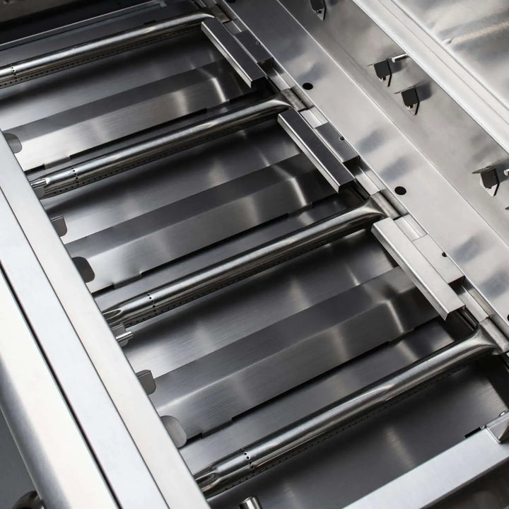 Blaze Prelude LBM 32" Built-In Gas Grill: Heavy-duty 304 stainless steel construction, four commercial-grade burners producing 56,000 BTUs across 715 square inches of cooking surface with heat zone separators and flame-stabilizing grids for precise temperature control and reduced flare-ups.