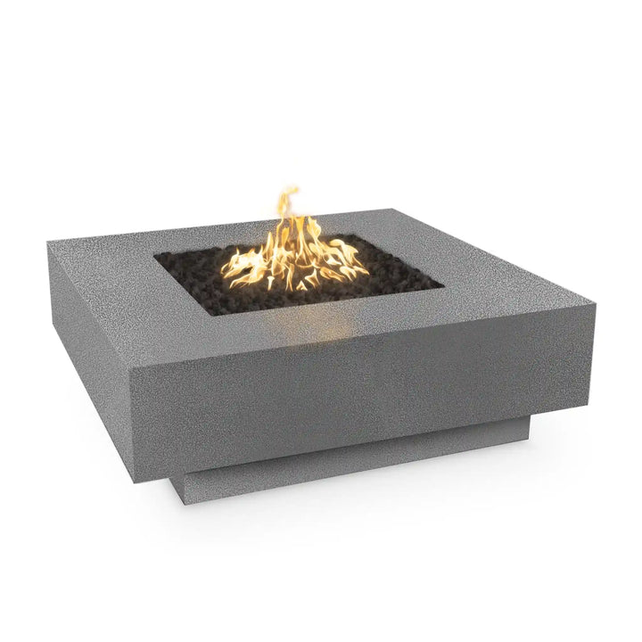 The Outdoor Plus Cabo Fire Pit, a low-profile design made from glass fiber concrete, features durable construction, CSA certified ignition options, and comes with match lit kit or electronic ignition system, fire pan/plate, burner, nipple & lava rock.
