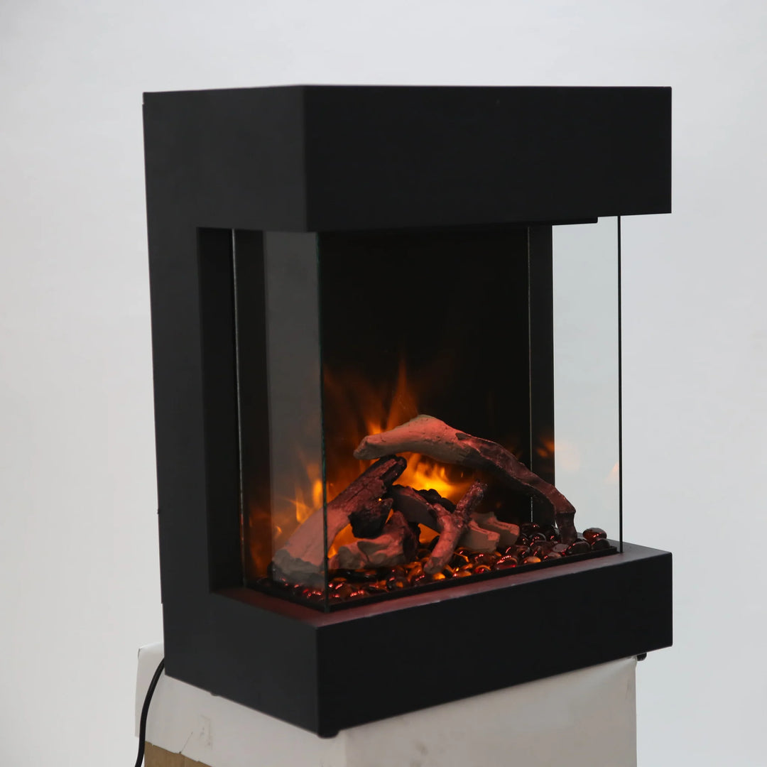 Amantii Cube 2025WM Freestand Electric Fireplace: A stylish, 3-sided glass electric fireplace with vibrant multi-colored flames, ambient canopy lighting, and customizable media options in 13 colors.