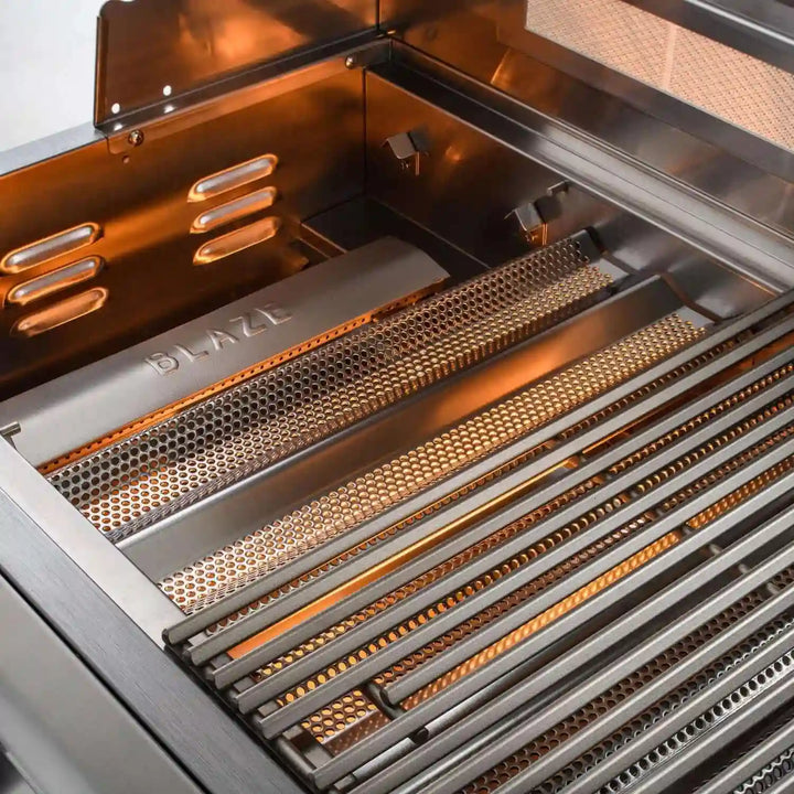 Blaze Premium LTE 40-Inch 5-Burner Built-In Grill featuring commercial-grade 304 cast stainless steel construction, 80,000 BTUs of total cooking power, and LED-illuminated control knobs for nighttime grilling.