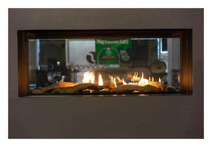 Sierra Flame Lyon 48" 4 Sided See Through Natural Gas Fireplace features a sleek design with double glass technology, eliminating safety screens for an unobstructed view of the mesmerizing flame, and warm glass system allowing safe touch glass with radiant heat.