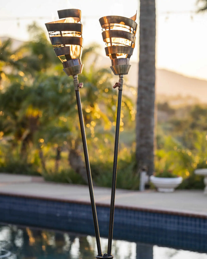 Spiral Fire Torch by The Outdoor Plus - A durable 304 stainless steel torch with 20,000 BTU output, adjustable flame control via built-in needle valve and compatible with 1/2" gas pipe or 2 1/2" post installation.