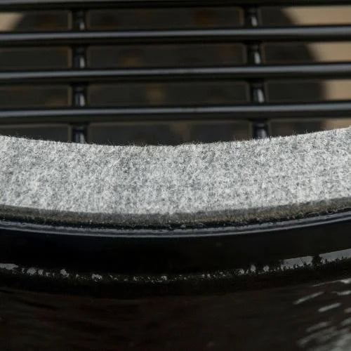 Primo Oval XXL 500 Charcoal Ceramic Kamado Grill features a patented oval design, ideal for grilling, smoking, and more, offering exceptional cooking flexibility and efficiency in a large 500 sq. in. surface area with two distinct zones.