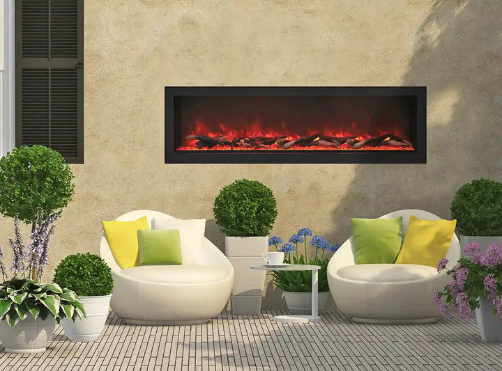 Remii DEEP Electric Fireplace features vibrant, multi-colored flame presentation in various colors, including yellow, orange, and red, along with ambient canopy lighting in 13 colors, housed within a black steel surround.