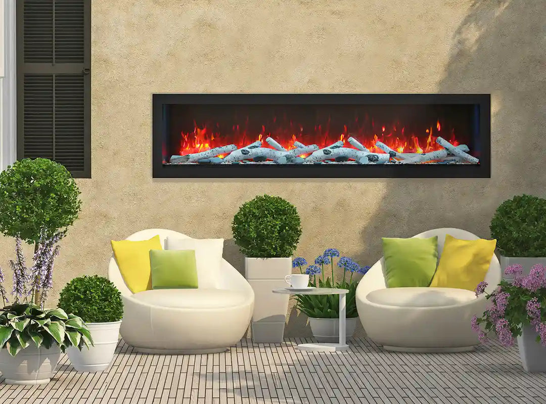Remii DEEP Electric Fireplace featuring vibrant, multi-colored flame presentation and ambient canopy lighting in 13 colors, with optional black steel surround and included remote control.