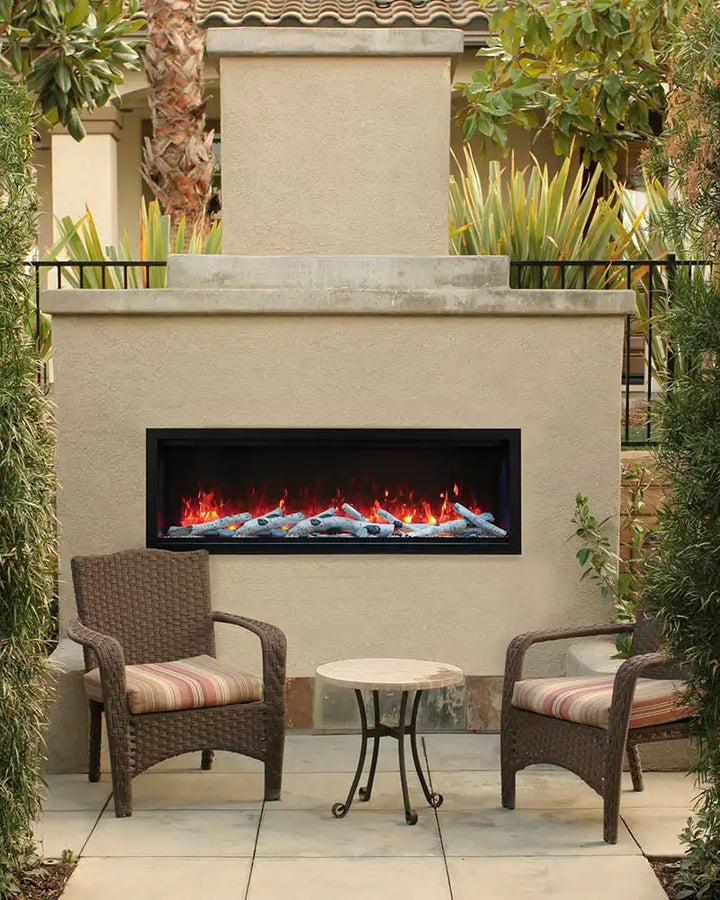 Remii Extra Tall Electric Fireplace features vibrant, multi-colored flames presented by three-color LED light strips, with options for red, yellow, or orange colors, set against a black steel surround and accompanied by ambient canopy lighting in 13 distinct hues.