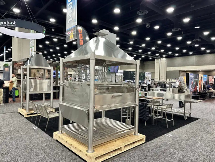 Tagwood The Silver Bullet XL Santa Maria Style Grill - Stainless Steel: Large-scale stainless steel grill featuring dual clamp grills, 3,200 sq. in. cooking space, and professional-grade performance for outdoor entertaining.