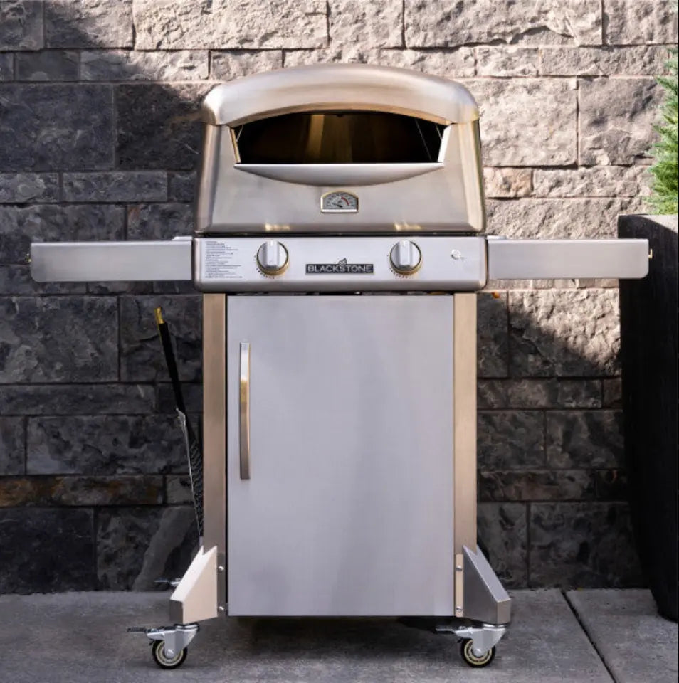 Blackstone Select Pizza Oven in action, featuring 65,000 BTUs of power, patented 2-Stone Technology, and luxurious design for perfect backyard pizza results.