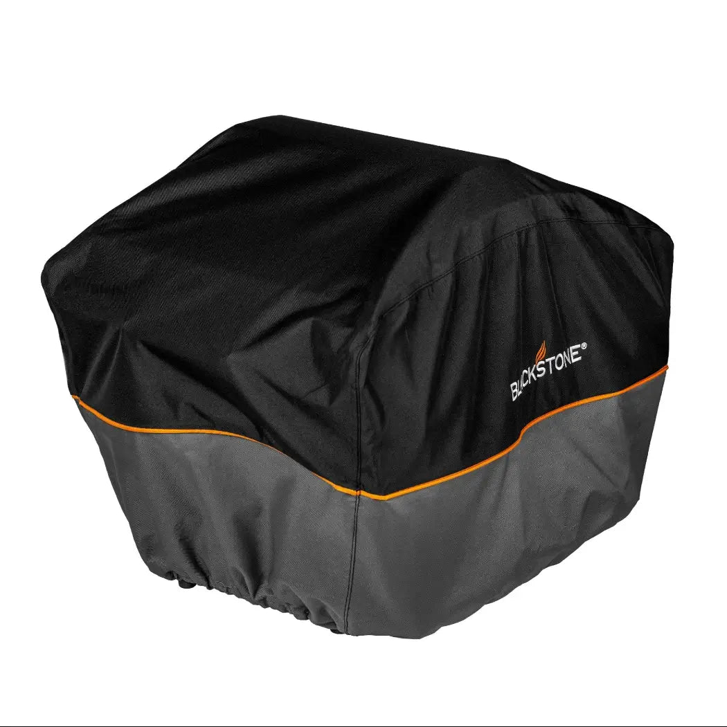 Blackstone Portable Pizza Oven Bundle featuring patented 2-Stone Technology for perfectly cooked pizzas every time, includes pizza peel, rocking cutter, and thermometer for precise control.