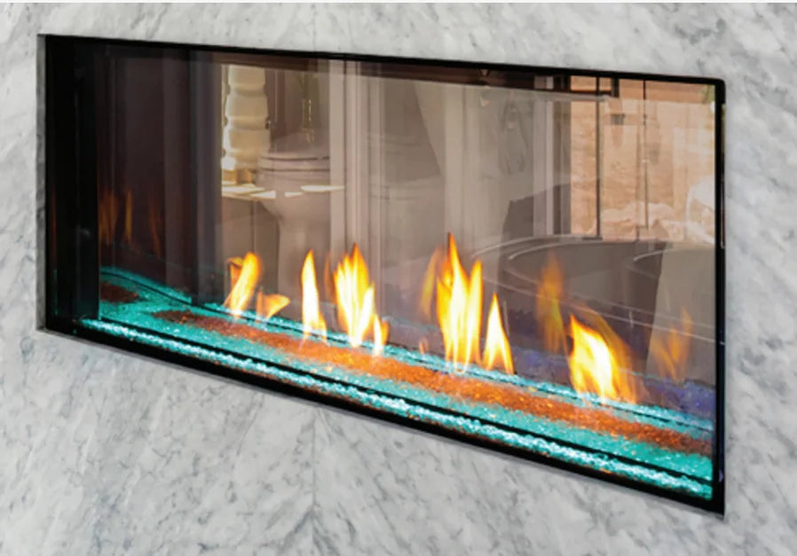 Plaza Luxury 75" Double-Sided Glass Barrier Linear Gas Fireplace features frameless edge-to-edge glass viewing area with vibrant flames visible from both sides, adjustable flame height and programmable LED under-lighting controlled by multi-function remote.