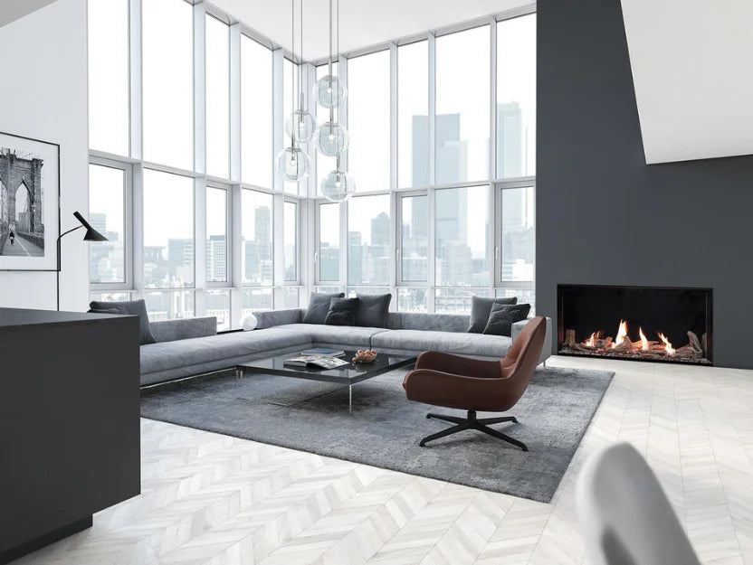 Plaza Luxury 55" Glass Barrier Single-Sided Linear Fireplace features frameless glass barrier design, creating seamless viewing experience with edge-to-edge flame presentation and programmable LED under-lighting controlled by multi-function remote.