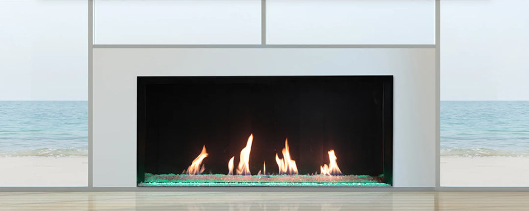 Plaza Luxury 75" Glass Barrier Single-Sided Linear Gas Fireplace features frameless glass barrier design with edge-to-edge viewing area, showcasing vibrant flames across 73.5" x 24" ceramic glass panel.