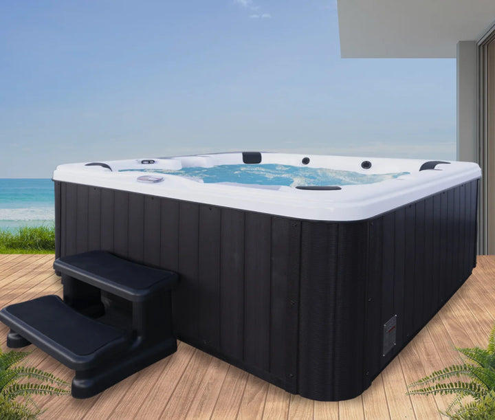 American Spas 6-Person Bench Spa featuring 45 strategically placed stainless steel jets for full-body hydrotherapy massage.