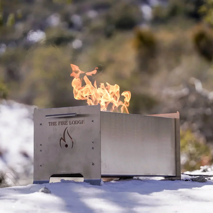 The Videl USA The Overlander - Burning Grill, crafted from professional-grade 316 stainless steel, features the patented Bullet Burner for superior fire performance and efficiency, making it perfect for rugged outdoor adventures.