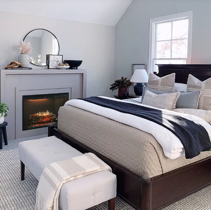 Dimplex Revillusion 24" Built-In Electric Firebox with ultra-realistic flames, hand-painted Realogs, and customizable brightness settings for year-round ambiance and supplemental heat.