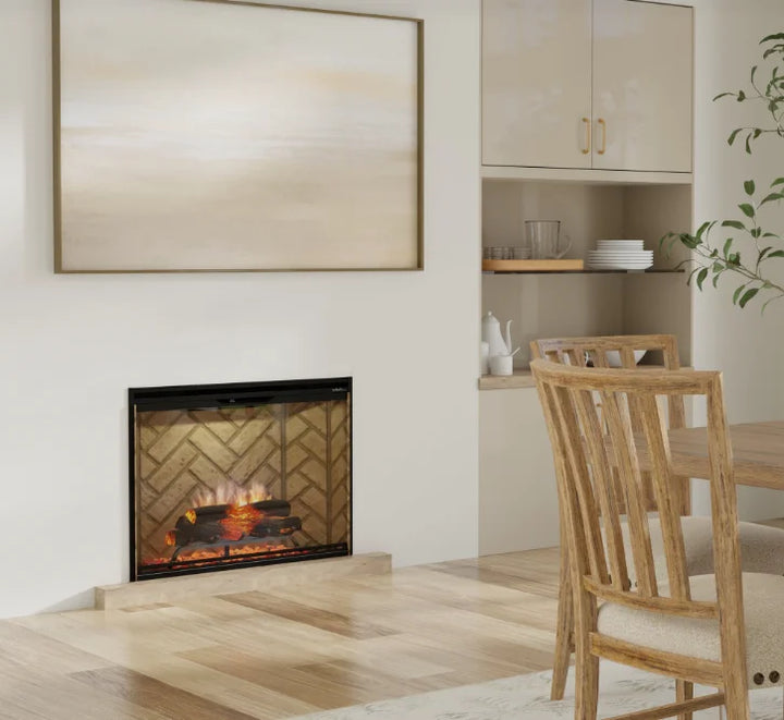 Dimplex Revillusion 42" Built-In Electric Firebox: Realistic flames project through Mirage panel, surrounded by handcrafted Realogs with LED glow and glowing ember bed with tumbled glass and black gravel.