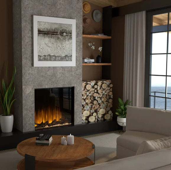 Dimplex Ignite Aspire Built-In Electric Firebox features Dynamic-Fire Flame Effect and Rhythmic Logs with Inner Glow Technology for an immersive experience with lifelike logs and ember bed that pulse in sync with flames and glow with natural tones.