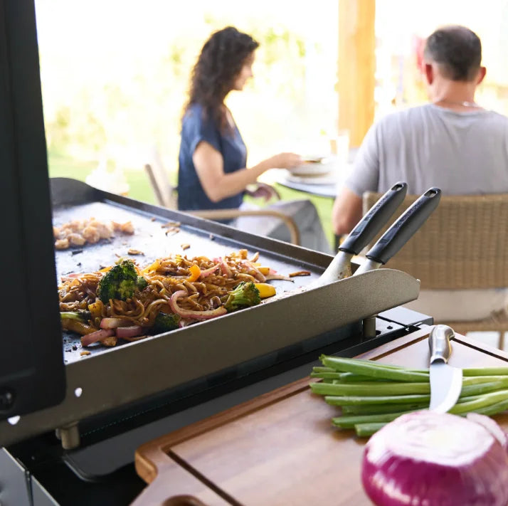 Blackstone Original 36” Griddle Air Fryer Combo featuring Omnivore Griddle Plate for fast heat distribution, dual air fryer drawers, and warming drawer for expanded outdoor cooking options.
