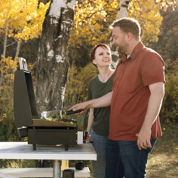 Blackstone Original 17" Blackout Omnivore Tabletop Stainless Steel Griddle with Built-in Hood for Outdoor Cooking and Travel.