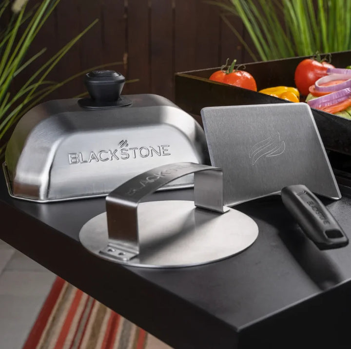 Blackstone Smash Burger Kit (3 Pieces) - Complete griddle essentials kit featuring durable stainless steel hamburger spatula, basting dome for melting cheese or steaming veggies, and burger press for crafting crispy-edged smash burgers.