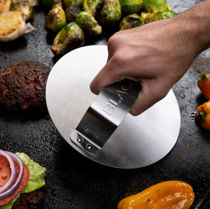 Blackstone Smash Burger Kit (3 Pieces) - A stainless steel cookware kit featuring a hamburger spatula, basting dome, and burger press for crafting classic smash burgers and more on your griddle.