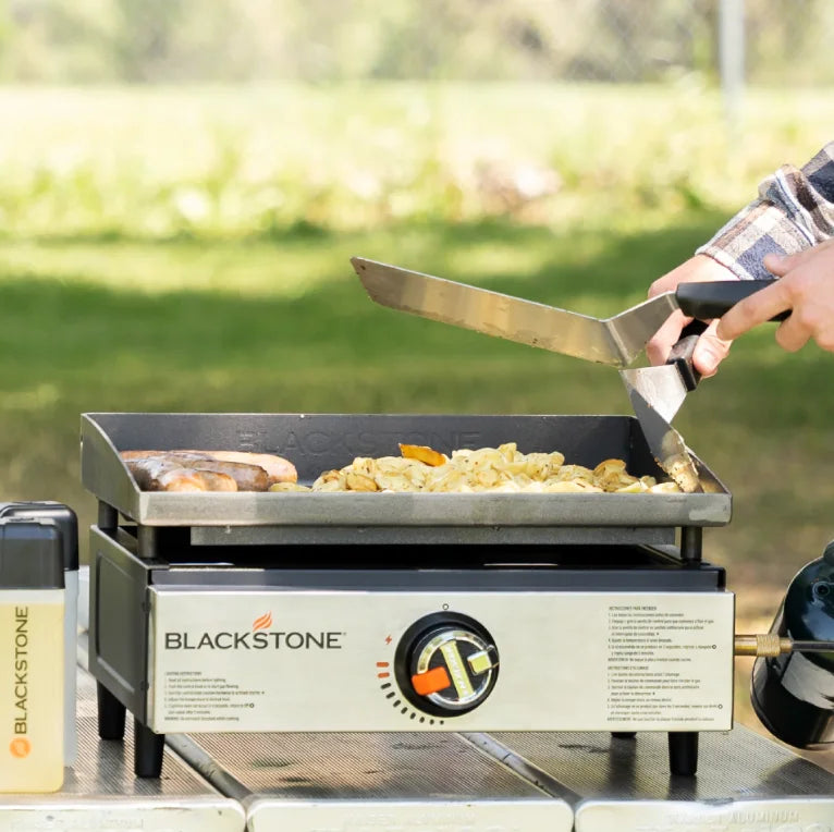 Blackstone Original 17” Tabletop Griddle: compact portable griddle with Omnivore Plate for even heat distribution, piezo ignition system, and rear grease management for easy cleanup.
