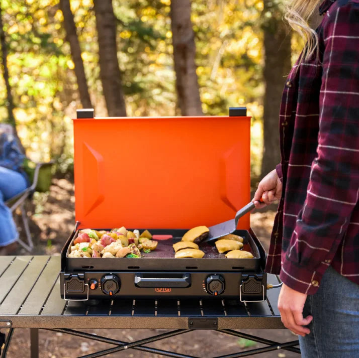 Blackstone OTG 20” Camping Griddle - Portable ceramic titanium-coated griddle plate with dual heat zones and compact travel design featuring leveling feet and stowaway grease management system.
