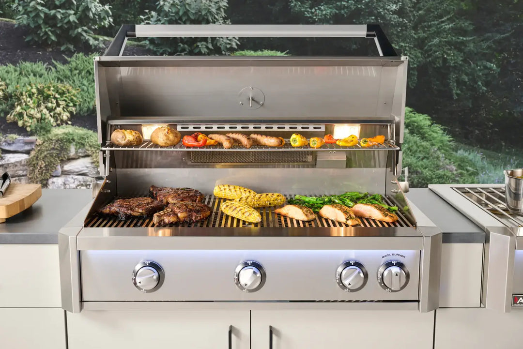 The 2026 American Outdoor Grill 30" T-Series Portable Grill features a heavy-duty stainless steel cart with fold-down shelves and dedicated storage, powered by Flame Thrower piezo ignition and equipped with diamond-patterned cooking grids for optimal heat transfer.