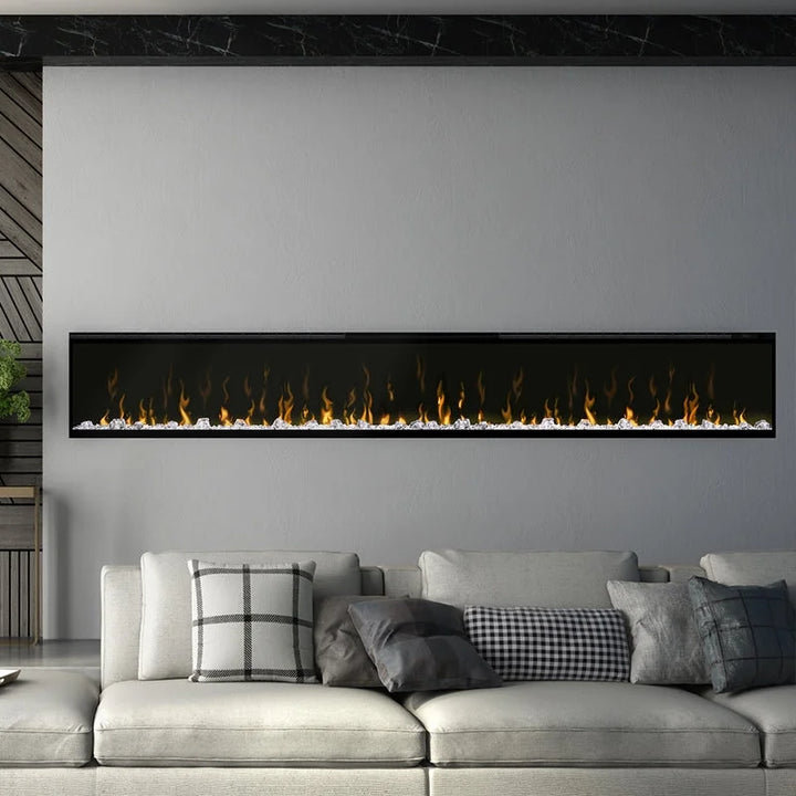 Dimplex IgniteXL Linear Recessed Electric Fireplace features lifelike flames and edge-to-edge glass for panoramic view.