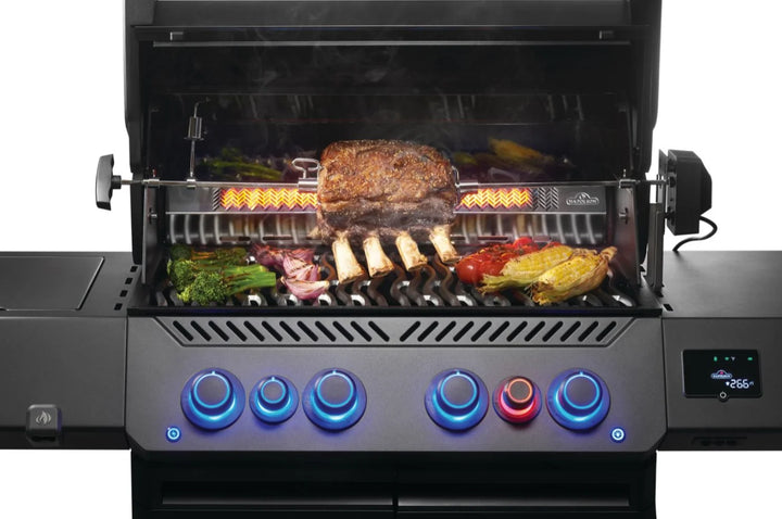 Napoleon Phantom Prestige 500 Series RSIB Gas Grill, sleek matte black finish, cast stainless steel cooking grids, Wi-Fi and Bluetooth connectivity, large infrared rear rotisserie burner, SIZZLE ZONE side burner, multifunctional warming rack.