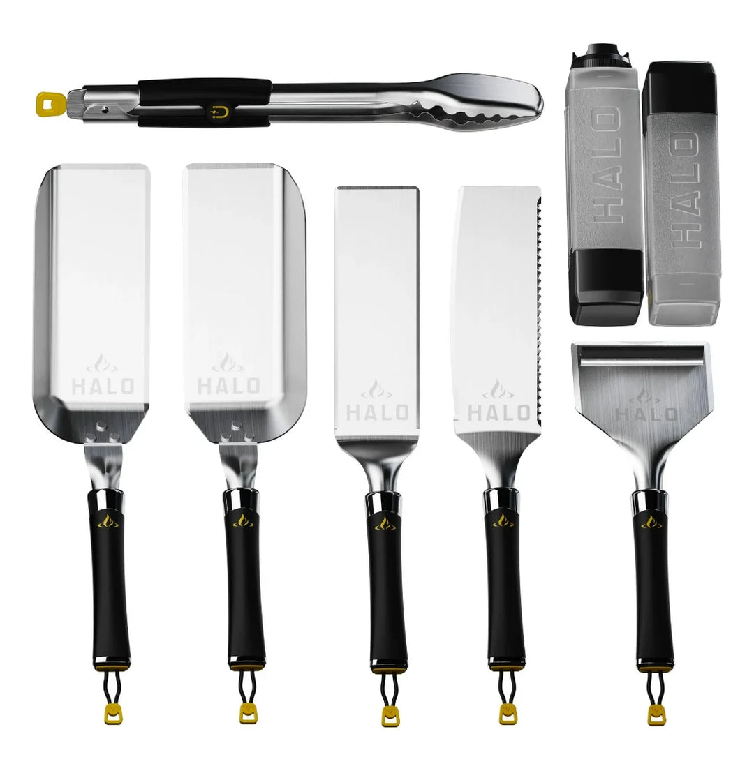 Halo Elite 8-Piece Griddle Tool Kit image featuring stainless steel tools including scoop spatulas, squeegee scraper, tongs, and dual squeeze bottles with magnetic handles designed for seamless griddling performance.