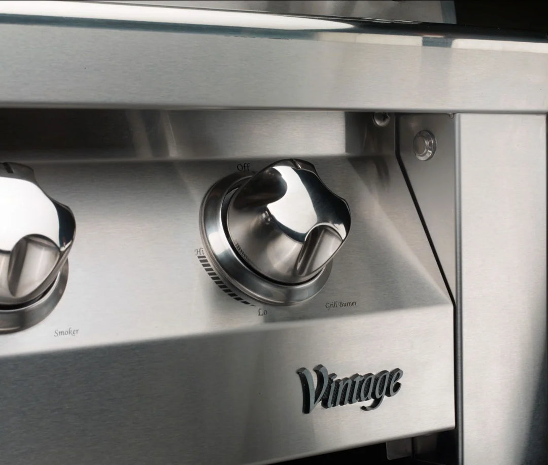 Vintage Grills 42" Freestanding Gas Grill on Standard Cart, featuring heliarc-welded stainless steel construction, 3 powerful burners, smoker system, and integrated rotisserie for versatile outdoor cooking.