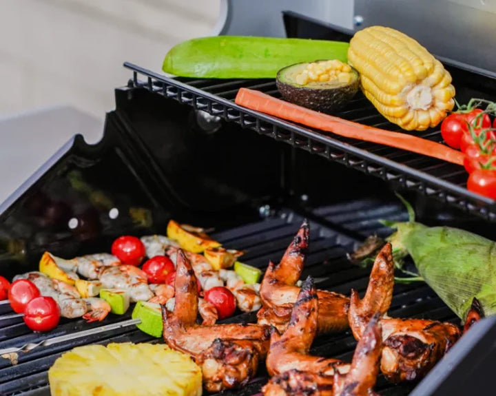 Monument Grills Mesa Series M200R Heartbeats Edition Red Powder-Coated Propane Gas Grill, featuring 2 burners delivering 30,000 BTUs for even heat and modern design with porcelain-coated cast iron grates.