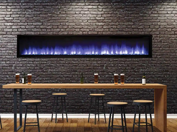 Superior ERL3000 Electric Fireplace in 100-inch linear model featuring smoked crystal ember bed with driftwood log accents, dual-colored yellow & blue flame effect, and multi-colored LED ember bed lighting.