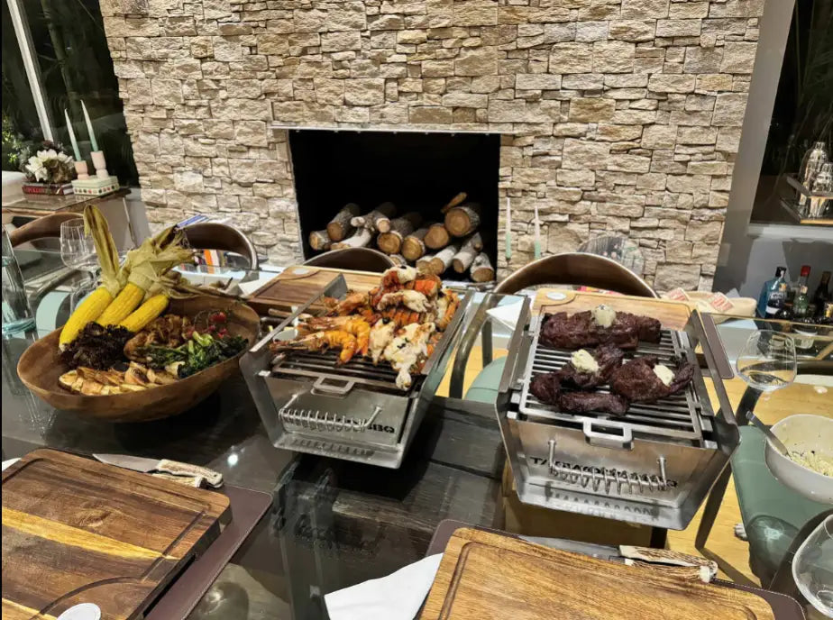 Tagwood Table Top Warming Brazier, crafted from 304 stainless steel and acacia wood, features a 121 sq. in. warming surface for perfectly warm dishes at the table.