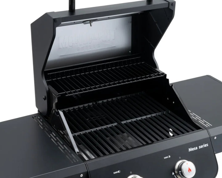 Monument Grills Mesa Series M220 gas grill featuring a compact, sleek design with two burners, delivering 30,000 BTUs of powerful heat output in a space-saving black powder-coated steel frame.