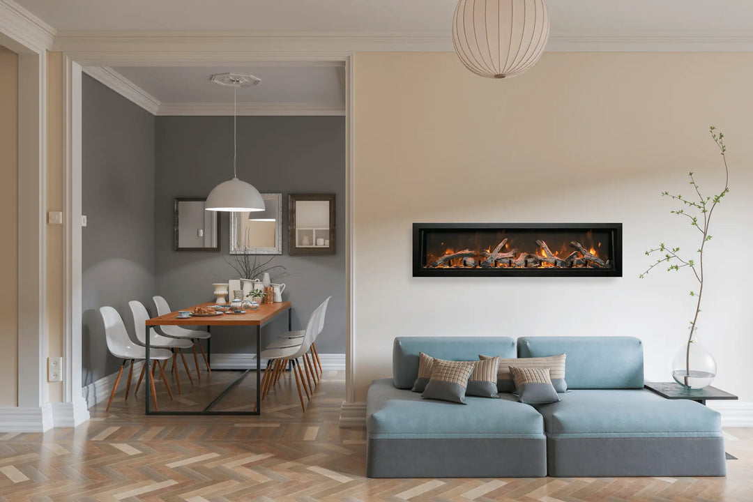 Remii DEEP Electric Fireplace: A stylish 12" deep indoor or outdoor built-in electric fireplace with black steel surround, featuring vibrant multi-colored flames, ambient canopy lighting, and a hardwire ready thermostat for up to 5000 BTU heat.