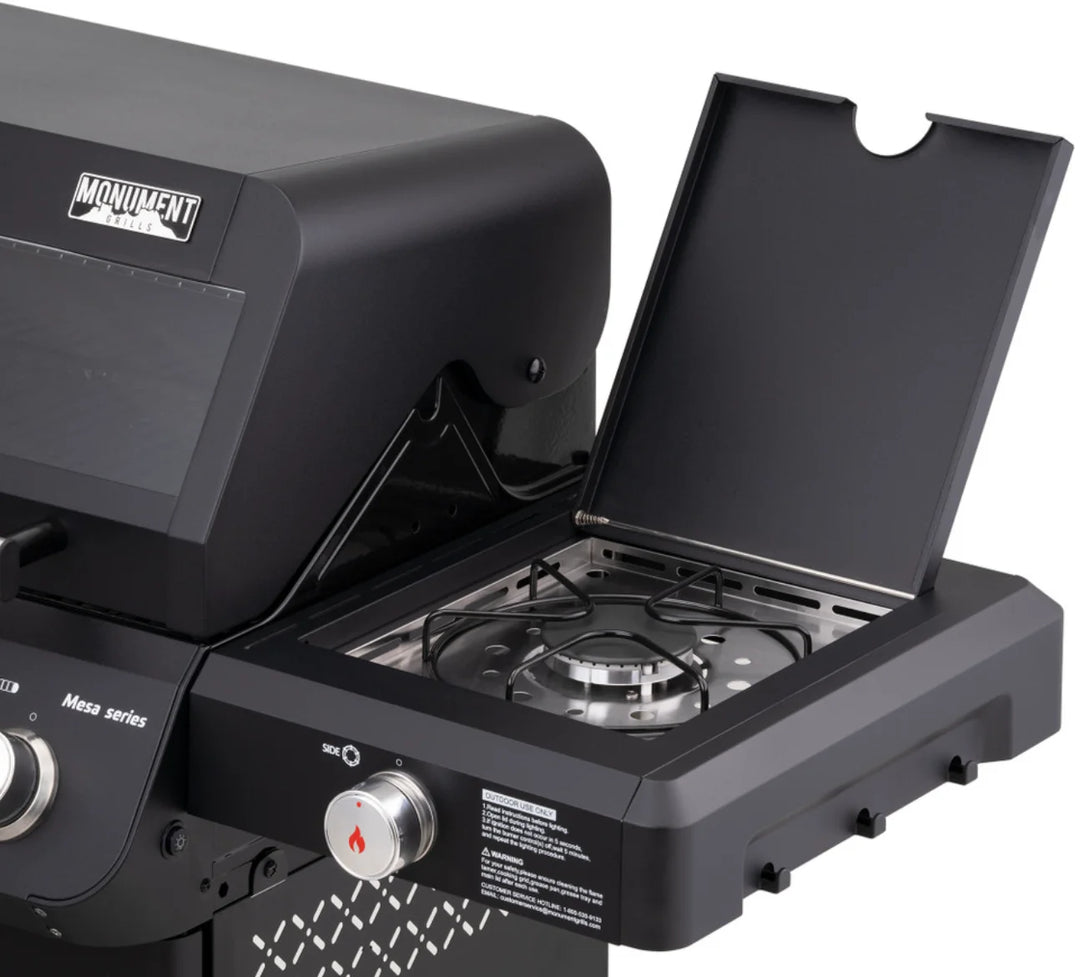 Monument Grills Mesa Series M425 gas grill image: 4 stainless steel burners, ClearView lid, side burner, durable black powder-coated finish and porcelain-coated cast iron grates.