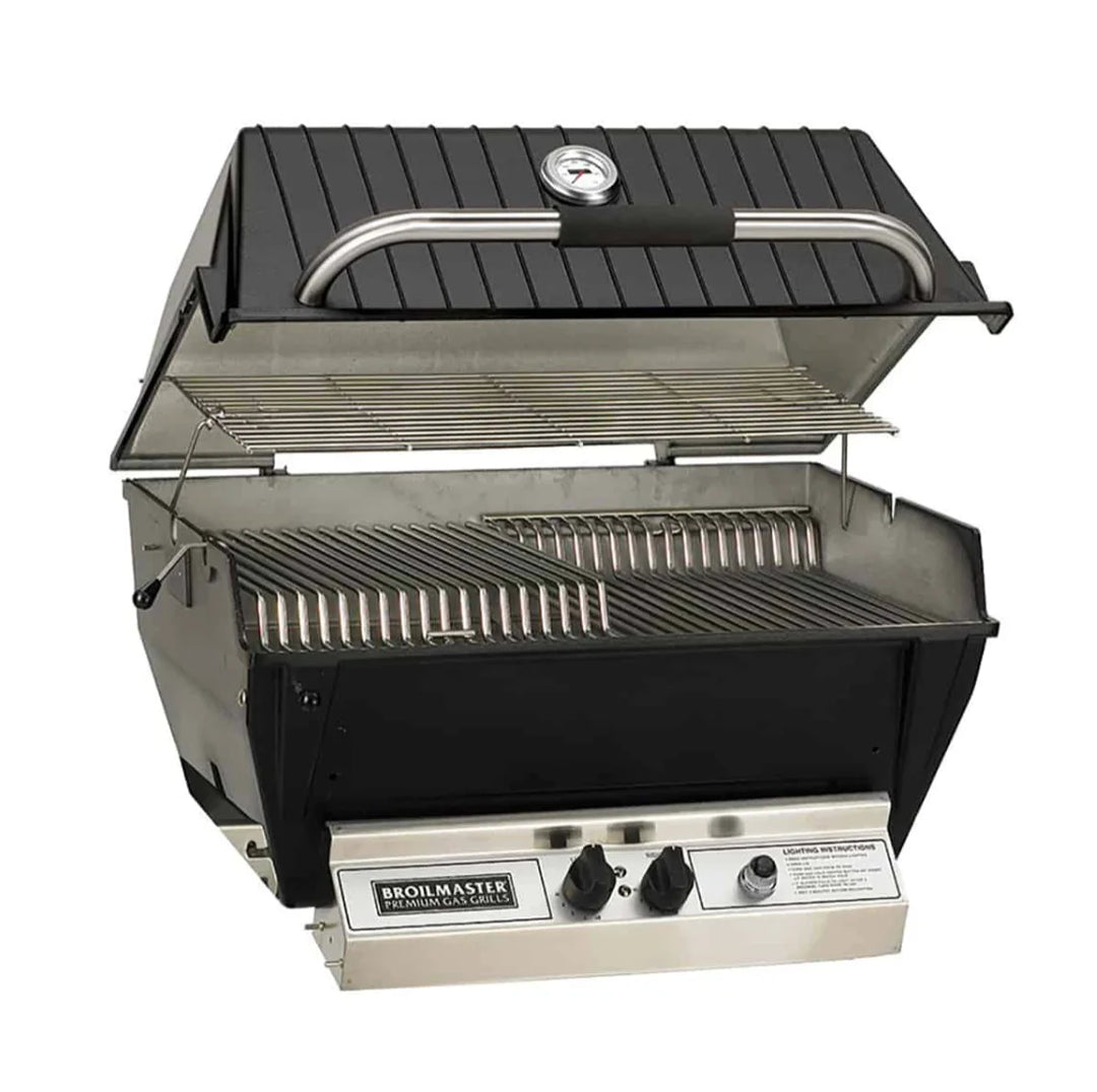 Broilmaster Premium Gas Grill features Stainless Steel Bow Tie Burner delivering 40,000 BTUs across 695 sq. in. cooking area, equipped with Flare Buster Ceramic Flavor Enhancers and Multi-Level Stainless Steel Cooking Grids for versatile grilling and smoking options.