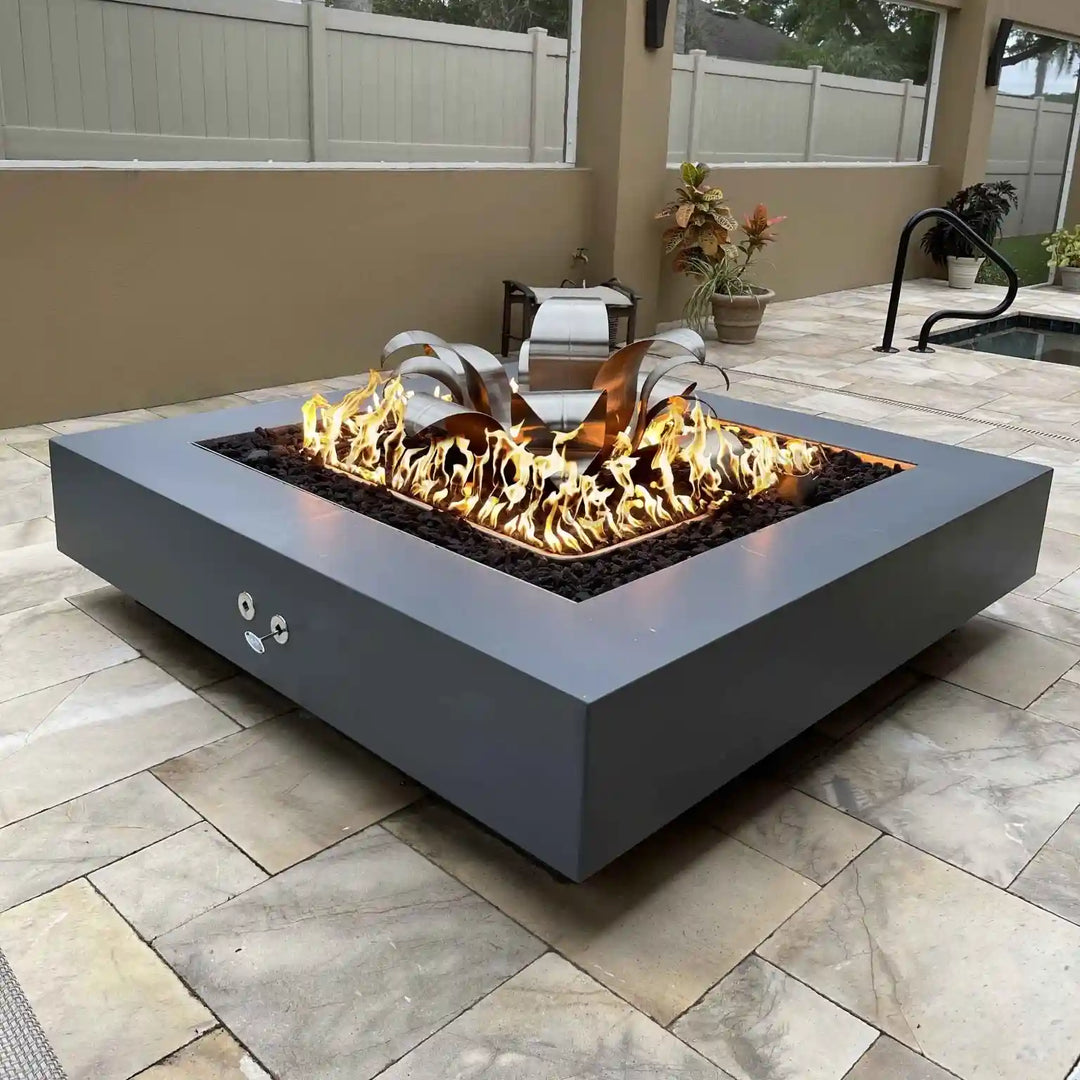 Low-profile Cabo Fire Pit by Outdoor Plus, featuring glass fiber concrete construction and available in various colors, includes match lit kit or CSA certified electronic ignition system.