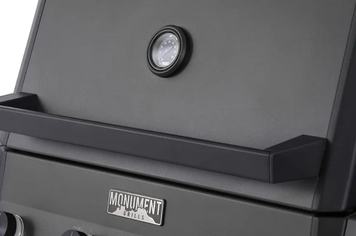 Monument Grills "E425" Gas Grill - Eminence Series features sleek pearl matte black finish, 640 sq. in. cooking space, die-cast aluminum and reinforced cast iron construction, and four 12,000 BTU main burners for professional-grade performance and timeless design.