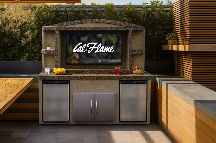 Cal Flame 'Paradise' Outdoor Entertainment Center featuring Ameristone Stucco finish, dual stainless steel refrigerators for cold beverage storage, 54" x 27" TV opening, under counter LED lights and spacious compartments with 30" double access door.