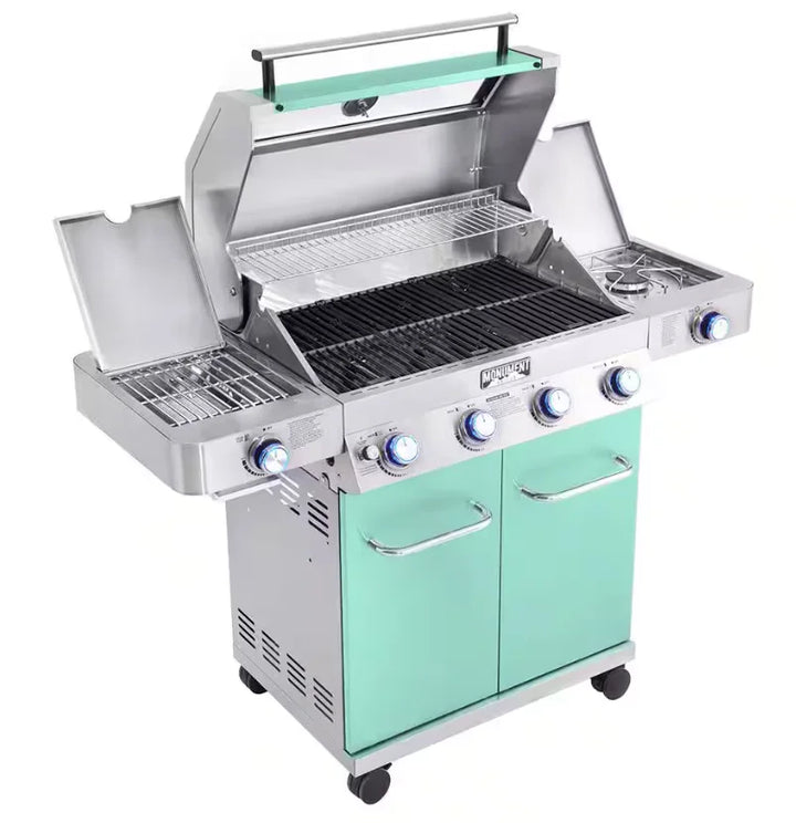 Monument Grills Classic Series Green 4-Burner Gas Grill - Stainless Steel Propane Grill with Infrared Side Sear Burner, ClearView Glass Lid and LED-Illuminated Control Knobs.