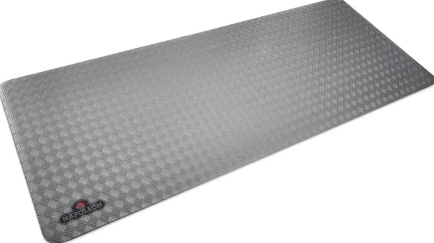 Napoleon Large Grill Mat protects decks and patios from grease, oil, sparks, and spills, featuring a fire-resistant grey diamond plate design for large gas or charcoal grills.