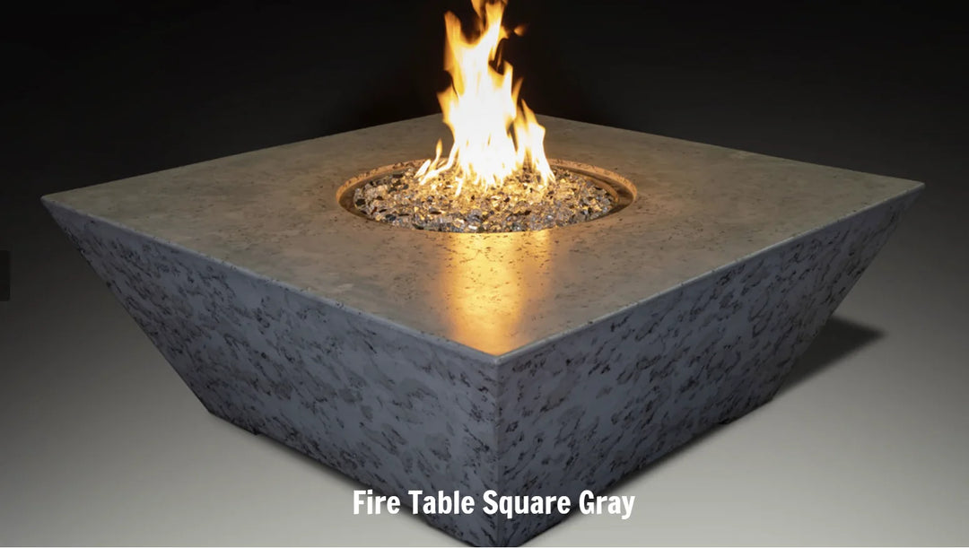 Grand Canyon - Olympus Square Fire Table: Modern American-made outdoor fire table with sleek design, contemporary angled sides, and generous tabletop space for food, drinks, or décor, crafted from durable GFRC materials.