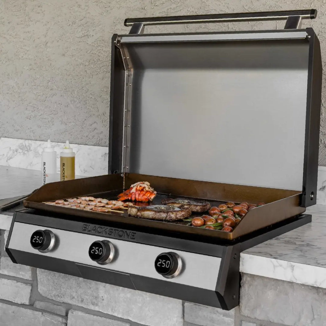 Blackstone 30” Electric Drop-In Griddle with 3 independently controlled heat zones, digital temperature readouts, and patented Omnivore Griddle Plate Technology for efficient cooking.