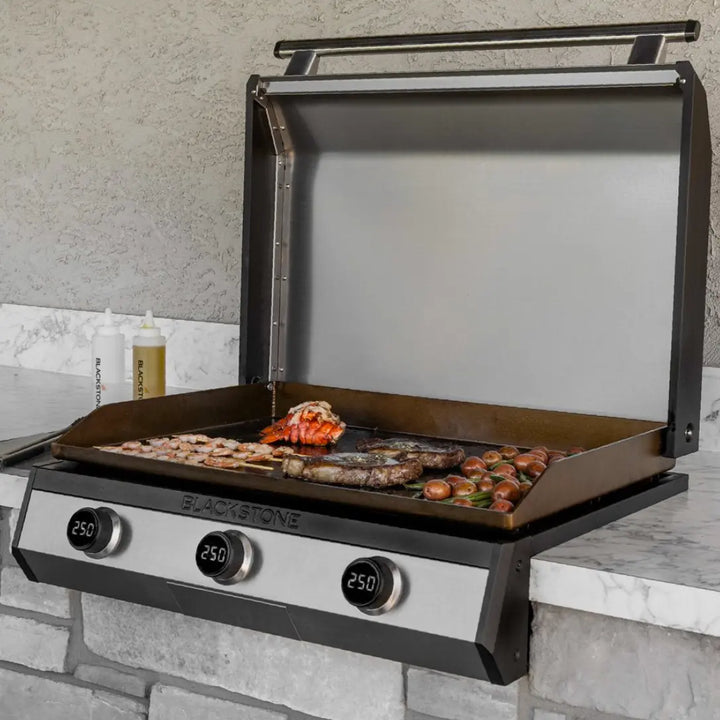 Blackstone 30” Electric Drop-In Griddle with 3 independently controlled heat zones, digital temperature readouts, and patented Omnivore Griddle Plate Technology for efficient cooking.